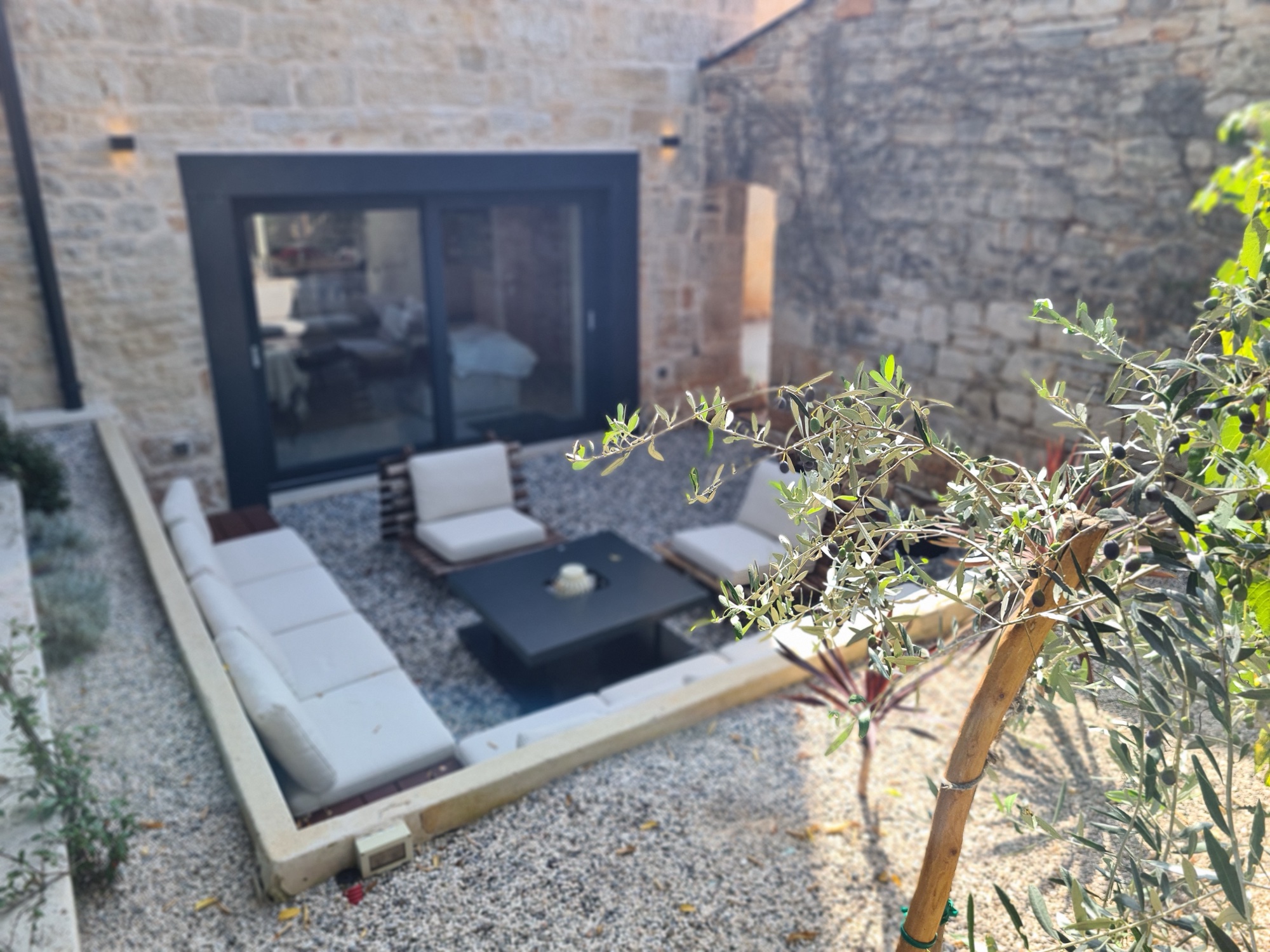 Heated pool with stone terrace